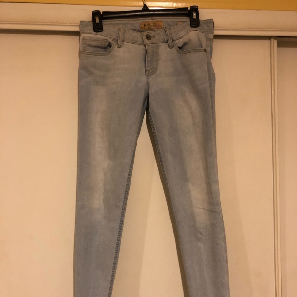 Guess skinny low rise light wash jeans. Size 27